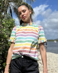 Luxury rainbow stripe puff shoulder top, pleated neck and sleeve details, 100% cotton hand-loomed statement blouse by GILD at brixbailey.com