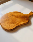 Handmade Olive Wood Round Freeform Charcuterie Board with Handle | Large Live Edge Cheese & Antipasti Serving Board | Bold Natural Grain | 33–46 cm