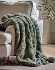 Premium chunky cable knit throw in dark olive green, super-soft diamond pattern, luxury textured blanket for sofa or bed by Ella James at brixbailey.com