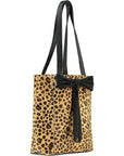Animal Print Bow Leather Tote – Compact & Chic Urban Style by Emmas Bags at brixbailey.com
