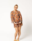 Enjoy Sun-Kissed Skin with the Smarttan UV Tunic - Comfort & Sun Protection by Smarttan at www.brixbailey.com