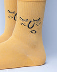 Premium yellow smiley face socks, luxury cotton blend, simple sophisticated design, sizes 37-42 EU, trending best-selling style by Body and I at brixbailey.com