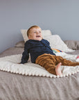 MINICAMP Kids Playmat in Ecru - Stylish & Cozy Handcrafted Playmat for Nurseries by Minicamp at brixbailey.com
