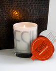 Luxury Tranquility scented candle with warming amber, pumpkin, and ground clove, handcrafted premium soy wax, long-lasting fragrance by Labyrinth Made Goods at brixbailey.com