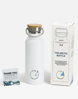 Premium Arctic Bottle, double-wall vacuum-insulated stainless steel, keeps drinks hot or cold, eco-friendly bamboo lid, leak-proof, BPA-free by Arcticus at brixbailey.com
