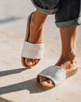Premium white vegan sandals with comfortable straps, cushioned footbed, slip-resistant sole, sustainable fair fashion by Fünve at brixbailey.com
