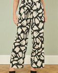 Yumi Black Cotton Splash Print Relaxed Fit Trousers
