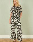Yumi Black Cotton Splash Print Relaxed Fit Trousers