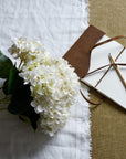 Lifelike white hydrangea arrangement in antique white vase, artificial flowers for home decor by sostter at brixbailey.com