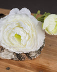 White artificial ranunculus spray with lifelike petals, 68cm long, perfect for home decor or floral arrangements. by sostter at brixbailey.com