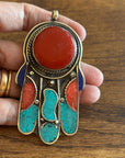 Silver Plated Tibetan Hamsa pendants.