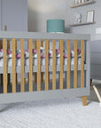 Grey Baby Cot with Adjustable Height Options