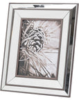 Mirror-edged wood photo frame in rich brown, showcasing 8x10 photo with elegant beveled trim and solid wood construction by sostter at brixbailey.com