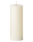 Realistic ivory LED wax candle with flickering amber flame, safe battery-operated home decor by sostter at brixbailey.com