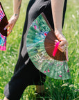 Green hand-held silk fan with 'Greenery' mushroom and crystal botanical artwork