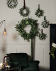 Frosted eucalyptus wreath with crystal-like foliage, doubles as candleholder for winter home decor. by sostter at brixbailey.com