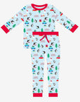 Premium Christmas pajama set for couples, cozy organic cotton sleepwear with penguin and snowman print, luxury matching holiday pajamas by Toby Tiger at brixbailey.com