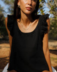 The Jeanne Ruffled Top in black