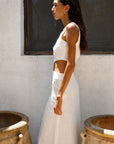 The Ava Asymmetric Maxi Dress in off-white
