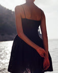 The Harlow Smocked Mini Dress in black