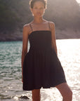 The Harlow Smocked Mini Dress in black
