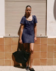The Clementine Mini Dress in navy blue