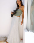 The Arabella Bias-Cut Maxi Skirt in striped olive green