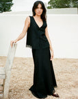 The Marie Sleeveless Wool Vest in black with lace trim
