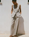 The Willow Wide-Leg Pleated Linen Trousers in oatmeal
