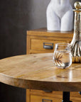 Adjustable industrial bistro table with weathered wood top and black metal frame, perfect for dining or entertaining. by Sostter at brixbailey.com