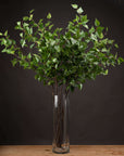 Lifelike green branch spray with lush foliage, 128 cm tall, perfect for vase arrangements, handcrafted artificial greenery by RoomLondon at brixbailey.com