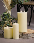 Realistic ivory LED wax candle with flickering amber flame, safe battery-operated home decor by sostter at brixbailey.com