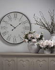 Large white wooden embossed wall clock with Roman numerals, 80cm diameter, traditional yet modern design by Sostter at brixbailey.com