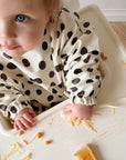 Long Sleeved Baby Bib - Spotty print
