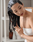 Luxury plant-based Balance Conditioner with argan oil, lavender, and vitamin E for healthy shiny hair and scalp by Dot & Lola at brixbailey.com