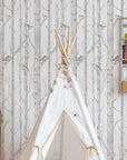 soft morning light on birch forest wallpaper for a calming kids room decor