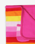 Pink striped organic cotton baby blanket by Brix Bailey for sleeping and cuddling at www.brixbailey.com