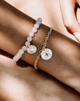 Cygnus Coin Charm Bracelet: Cubic Zirconia
