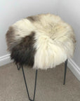 Luxury 35cm round sheepskin seat pad, premium British rare breed, sustainable eco-tanned, handcrafted natural melange, stylish home decor by Wildash London at brixbailey.com