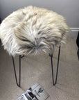 Premium 35cm round sheepskin seat pad, luxury British rare breed natural melange, handcrafted sustainable comfort, soft insulating breathable by Wildash London at brixbailey.com