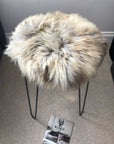 Premium 35cm round sheepskin seat pad, luxury British rare breed natural melange, handcrafted sustainable comfort, soft insulating breathable by Wildash London at brixbailey.com