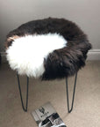Premium British sheepskin seat cover, natural brown with white cream ivory feature, 35cm round hide, luxury hypoallergenic sustainable fur by Wildash London at brixbailey.com