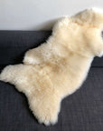 Luxury premium white sheepskin rug, super soft long fur, handcrafted natural ivory fleece, medium size throw, machine washable by Wildash London at brixbailey.com