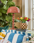 Striped floor lamp in a colourful living room, from independent brands at Brix + Bailey.