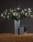 White artificial passion flower spray with green foliage, 89 cm tall, lifelike petals and corona filaments for home decor by sostter at brixbailey.com