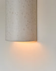 Handcrafted Ceramic Wall Light in Raw White Curve