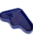 bold statement triangle ceramic wave tray in deep speckled blue glaze