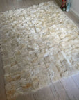 Luxury champagne Tuscan shearling throw rug, ultra-dense fur, super soft, handcrafted, best-selling, stylish home decor by Wildash London at brixbailey.com