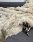 Luxury champagne Tuscan shearling throw rug, ultra-dense and super soft, handcrafted premium fur for bed or sofa, best-selling unique piece by Wildash London at brixbailey.com