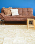 Luxury champagne Tuscan shearling throw rug, premium handcrafted unique piece, stylish bed or sofa decor, best-selling warm textured home accent by Wildash London at brixbailey.com